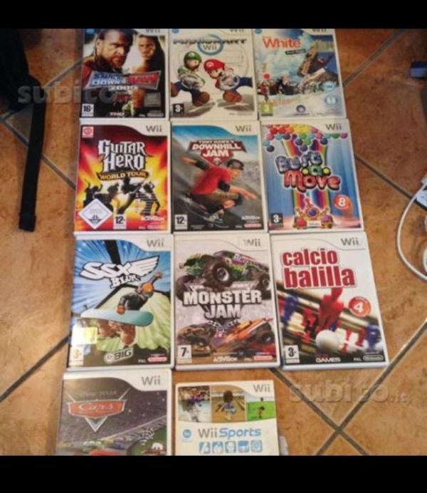 Wii + 11 giochi + Guitar Hero